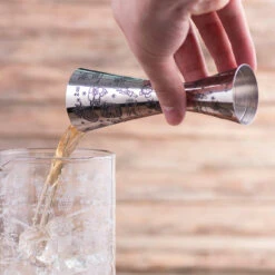 Urban Bar Etched Tiki Aero Stainless Steel Cocktail Jigger - 1oz & 2oz -Bar Supplies 18002293 Urban Bar Etched Tiki Aero Stainless Steel Cocktail Jigger 1oz 2oz 4 20960.1592498785